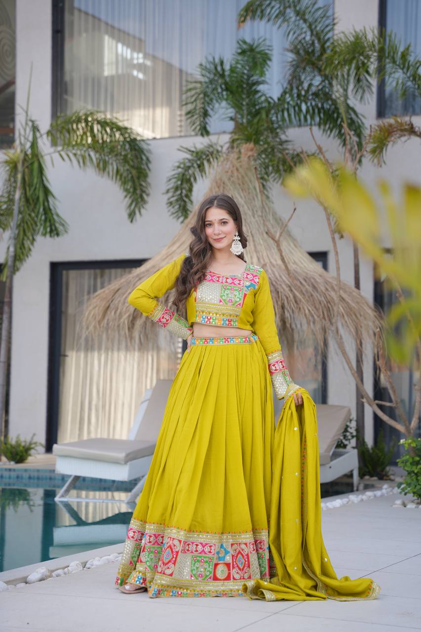 Celebrate in Style with This Exquisite Vichitra Silk Lehenga Choli Featuring Elegant Sequence Work