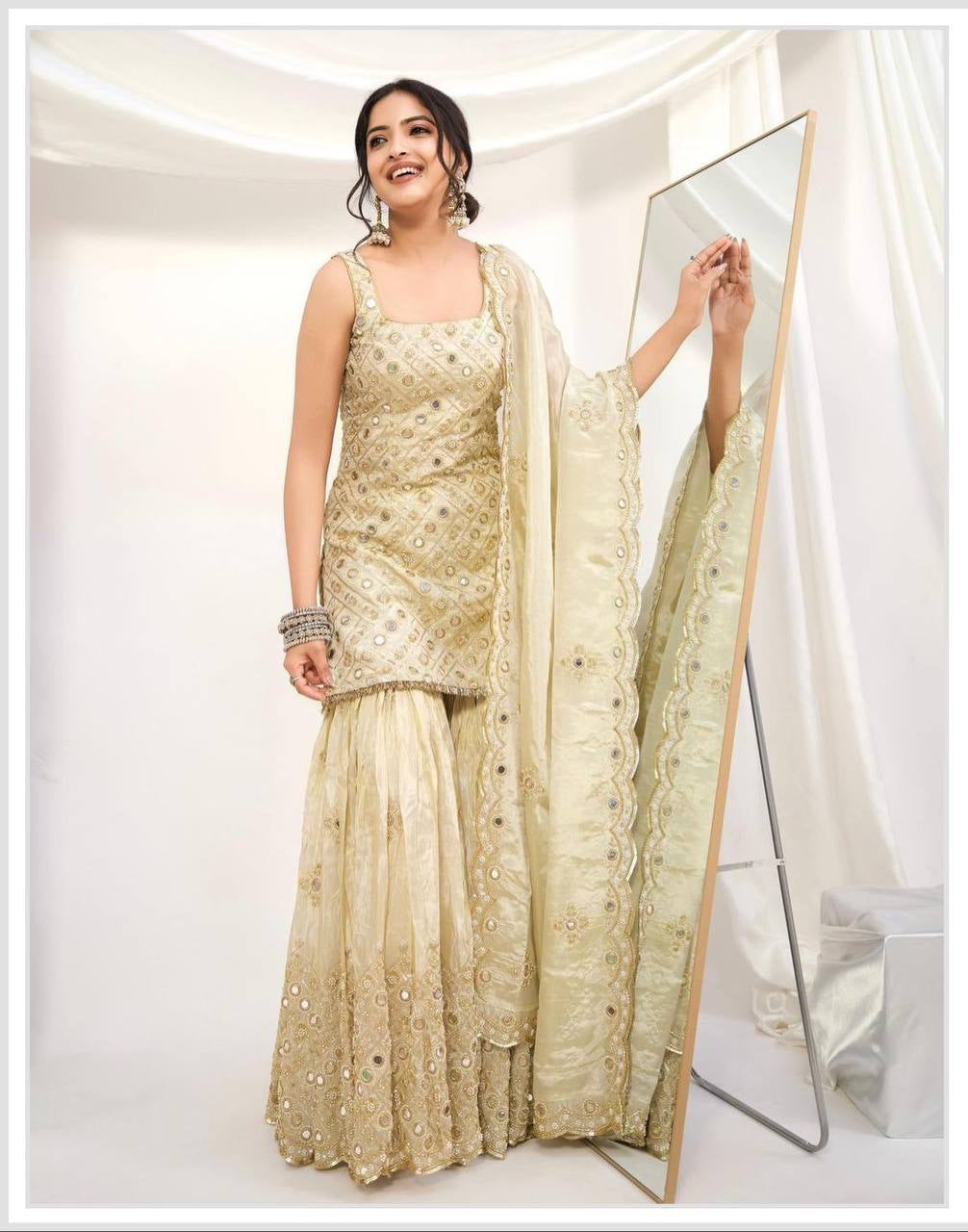 Chic Party Ensemble in Natural Crepe Featuring Heavy Sequin Embroidery and Matching Dupatta