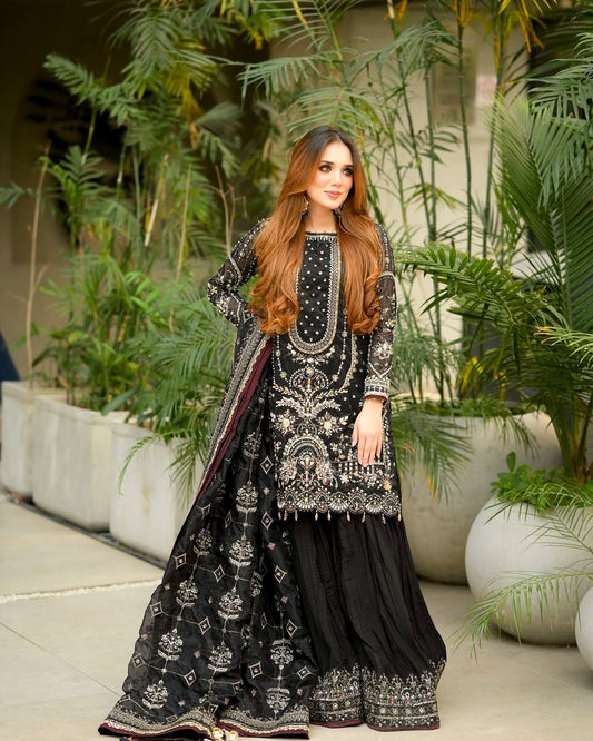 Exclusive Heavy Faux Georgette Ensemble with Sequin Embroidery and Fancy Latkan Border