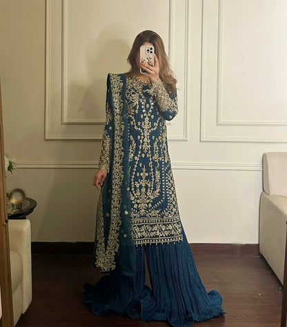 Exclusive Party Wear Outfit in Heavy Faux Georgette with Rivet Moti and Embroidery Work