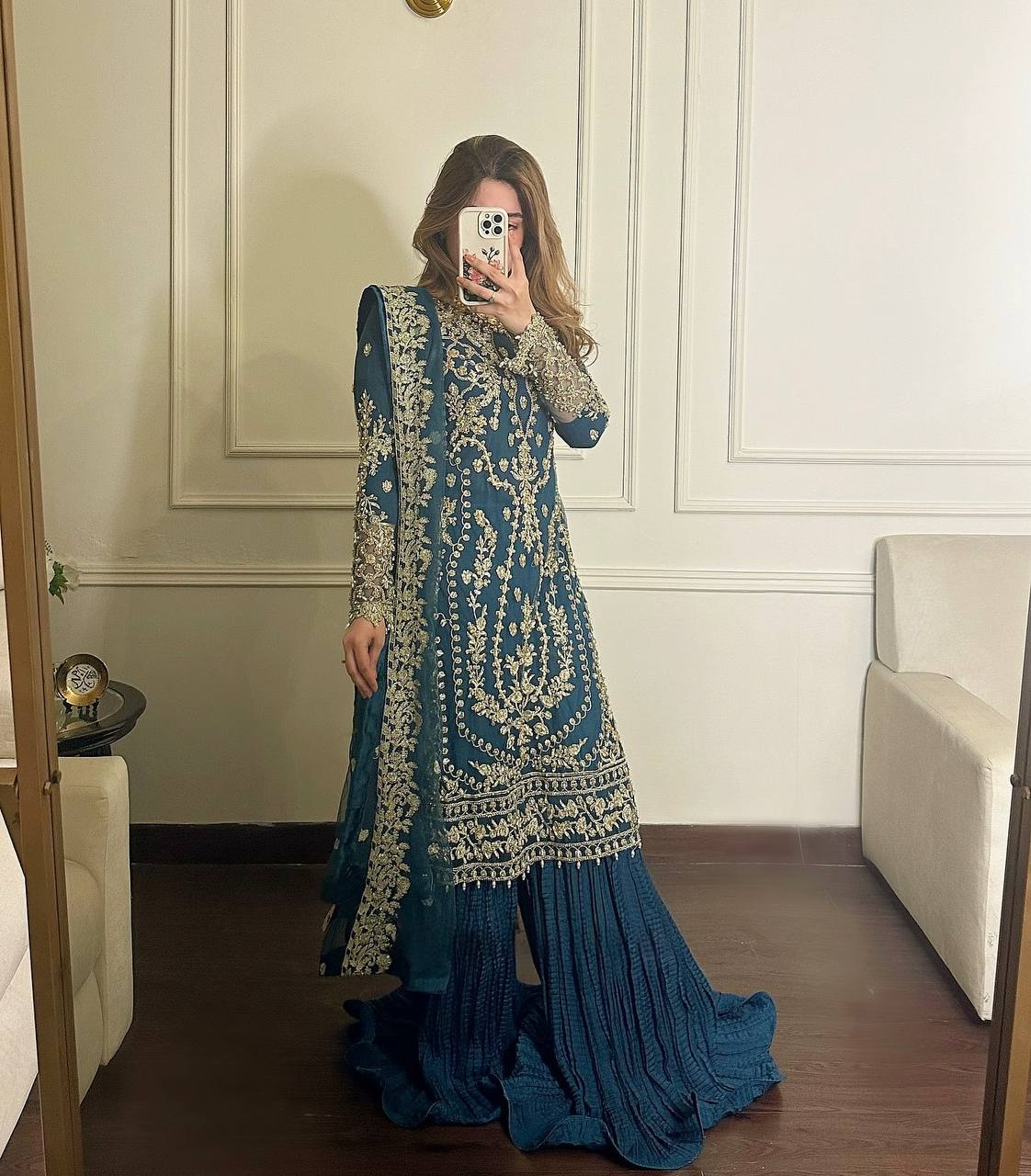 Exclusive Party Wear Outfit in Heavy Faux Georgette with Rivet Moti and Embroidery Work