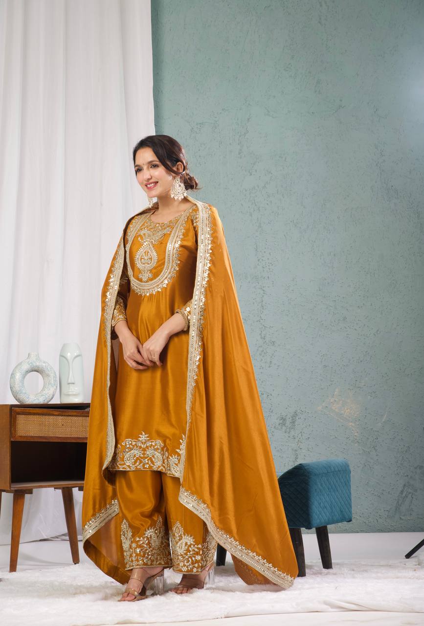 Graceful Pure Chinnon Silk Ensemble Showcasing Heavy All-Over Coding Sequin Embroidery Work