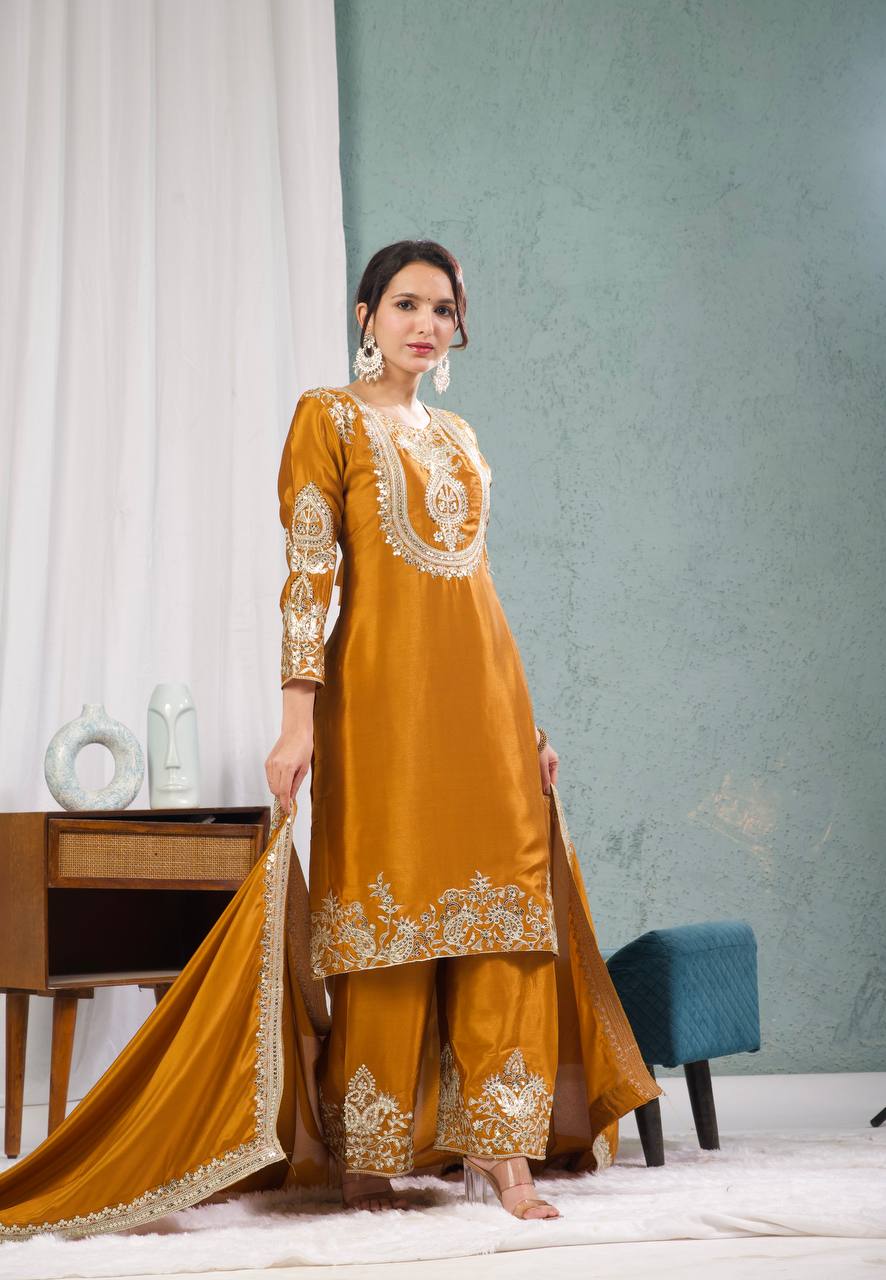 Graceful Pure Chinnon Silk Ensemble Showcasing Heavy All-Over Coding Sequin Embroidery Work